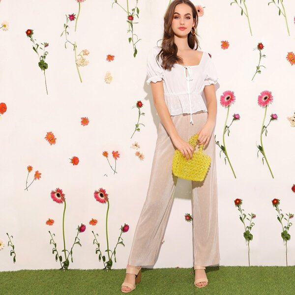 

Tie Neck Schiffy Ruffle Hem Top