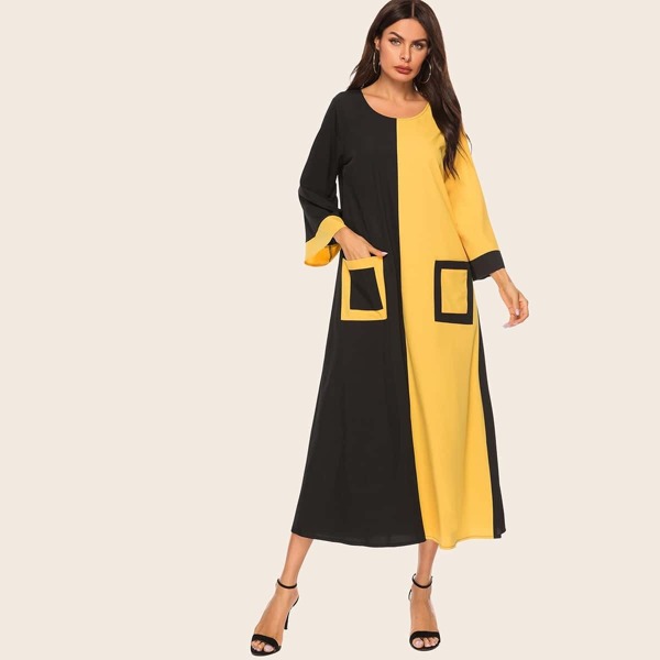 

Cut And Sew Dual Pocket Longline Dress