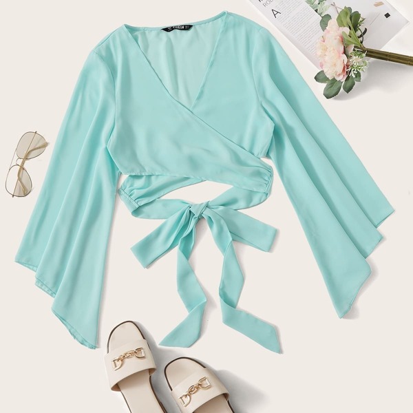 

Plunging Neck Bell Sleeve Cross Wrap Crop Top