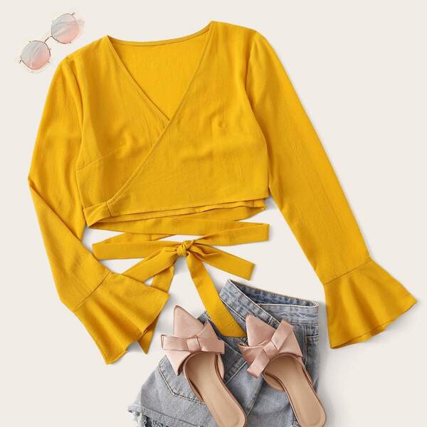

Solid Criss Cross Flounce Sleeve Top