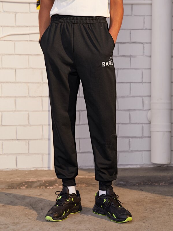 

Men Elastic Waist Slant Pocket Embroidery Pants, Black