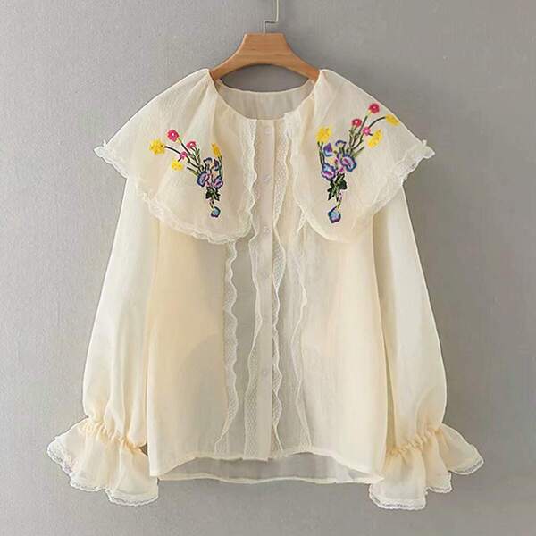 

Flounce Sleeve Flower Embroidery Ruffle Trim Blouse