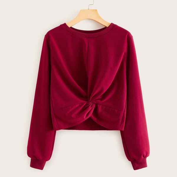 

Solid Round Neck Twist Hem Sweatshirt