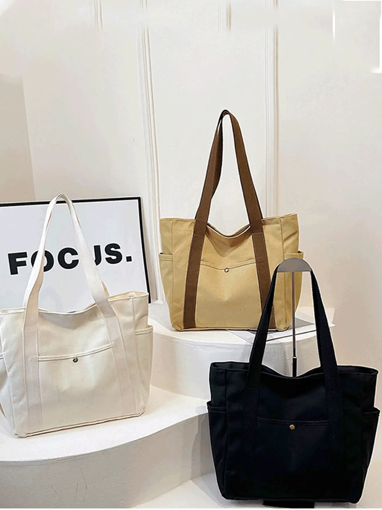 这款时尚大容量帆布手提包采用拉链封口，配有多个侧袋和结实耐用的肩带，是携带笔记本电脑、书籍等物品的理想之选。轻便耐用，超级实用，是工作、通勤、返校、情人节、母亲节的完美礼物。 - 彩色 - 查看 3