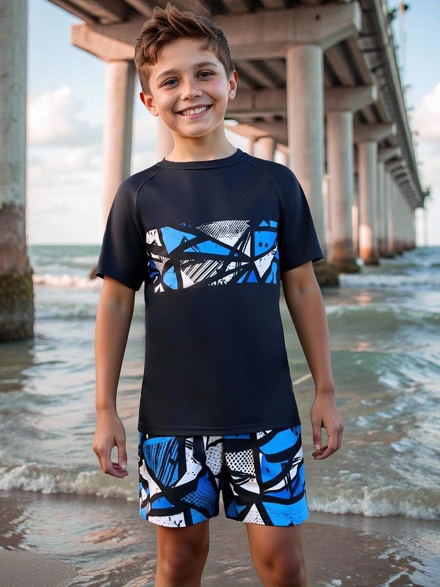 SHEIN Tween Boys Geometric Print Swimsuit Set,Short-Sleeved Top + Printed Beach Shorts Two-Piece Set,Surfing Suit - Navy Blue - View 1