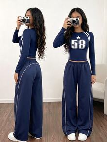 SHEIN ChillGRL Two-Piece Set For Older Girls: Navy Blue Number Print Knitted Fitted Short-Sleeved Top Paired With Loose-Fitting Casual Combed Trousers. - Blue - View 2