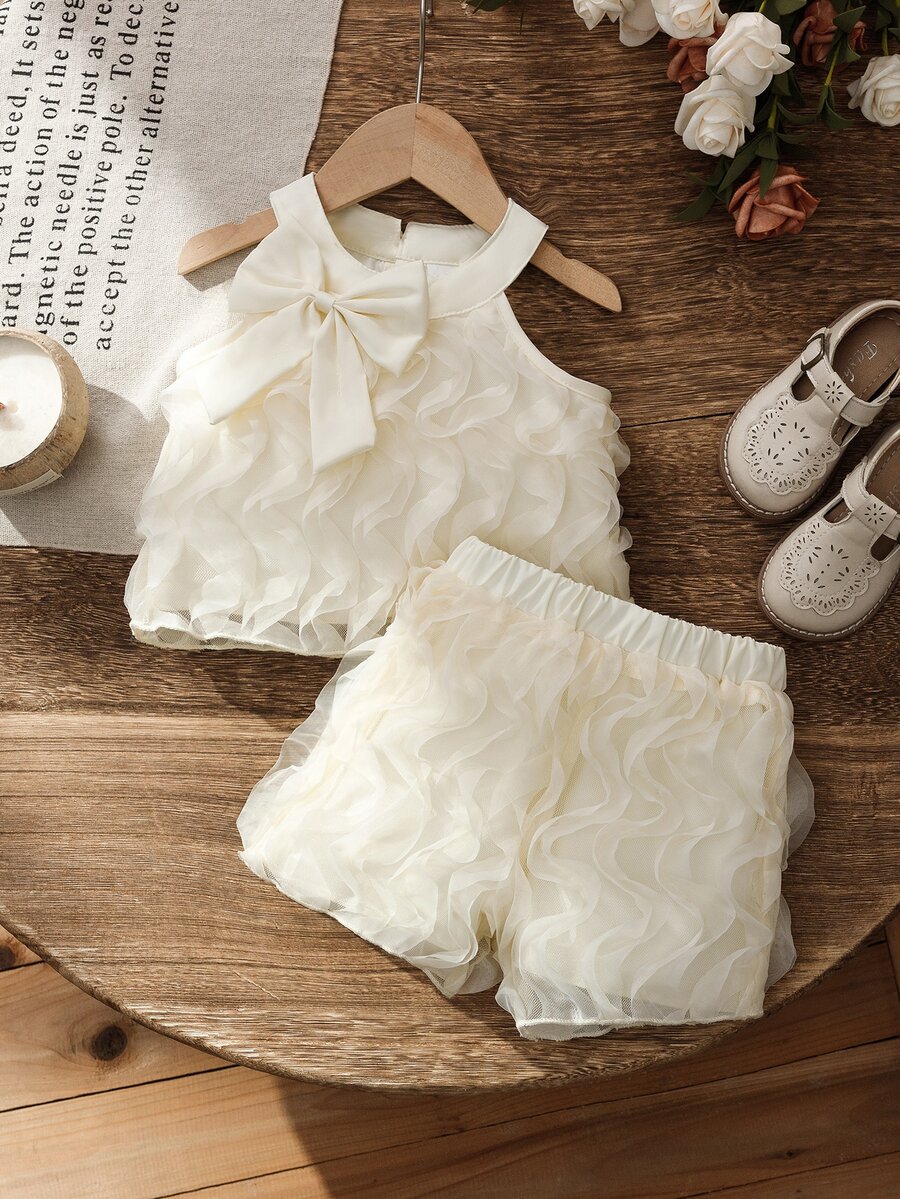 SHEIN 女童 2 件組夏季時尚套裝，蝴蝶結裝飾圓領掛脖背心上衣 + 休閒可愛寬鬆短褲，2 歲生日，婚禮米白色