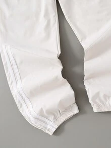 SHEIN Explorewe 2件組青少年男孩側邊不對稱條紋長褲 鬆緊褲腳 寬鬆休閒運動長褲 秋季校園運動款 米色黑白條紋 - 黑與白 - 查看 4