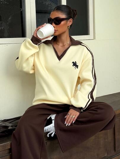 Muchica 2pcs Women's Casual Long-Sleeved V-Neck Top Featuring A Tan Color-Block Design (Adorned With Equestrian-Style Motifs), Paired With Matching Trousers.