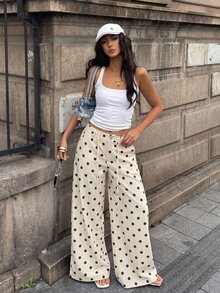 Coolane 女款秋冬外出休閒街頭風性感Y2K時尚度假日常穿搭可愛學院風奶油黃波點細肩帶直筒長褲 - 黑與白 - 查看 2