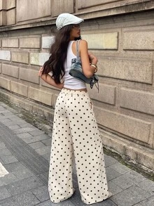 Coolane 女款秋冬外出休閒街頭風性感Y2K時尚度假日常穿搭可愛學院風奶油黃波點細肩帶直筒長褲 - 黑與白 - 查看 6
