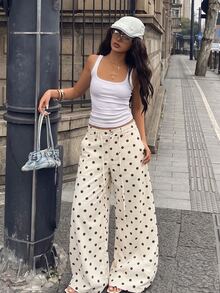 Coolane 女款秋冬外出休閒街頭風性感Y2K時尚度假日常穿搭可愛學院風奶油黃波點細肩帶直筒長褲 - 黑與白 - 查看 3