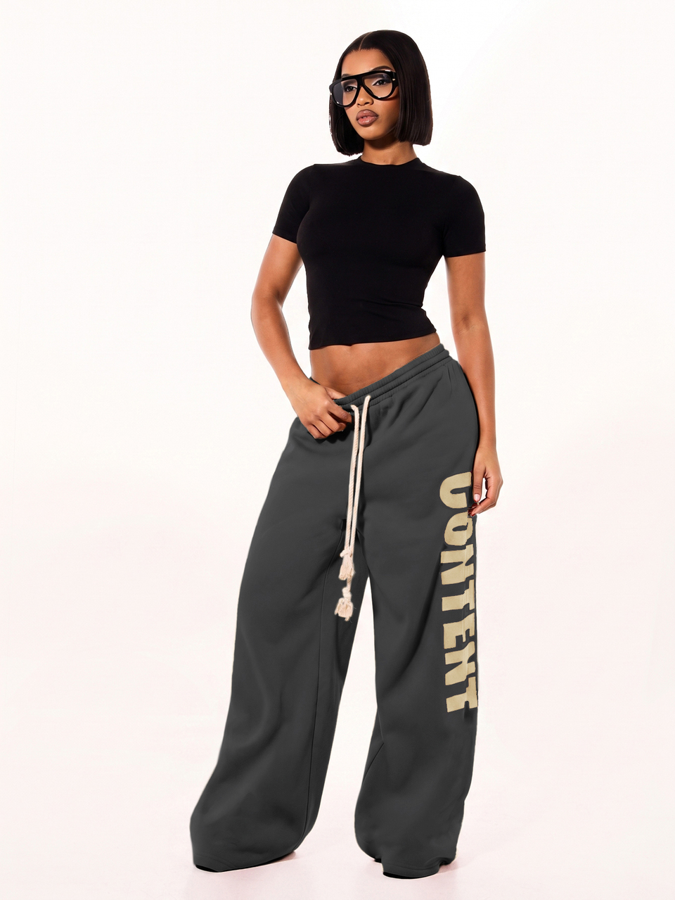 SUMWON WOMEN Oversized weite Jogginghose mit vertikalem Buchstaben-Muster und Kordelzug-Bund für lässige Alltags-Komfortkleidung im Herbst und Winter