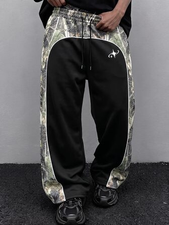 Pantalon de survêtement ample streetwear pour hommes avec imprimé fonctionnel patchwork camouflage ombre d'arbre