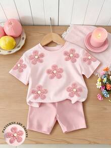 SHEIN 2pcs/Set Casual Fashionable Versatile Spring/Summer Young Girls T-Shirt Set. Featuring A Sweet Pink Floral Pattern Top With A Relaxed Round Neck Short Sleeve Design, Paired With Bike Shorts. A Comfortable And Stylish Spring/Summer Outfit Set For Young Girls. - Multicolor - View 3
