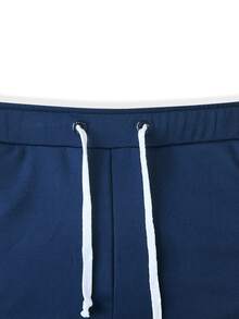 Manfinity Homme Quần nỉ nam họa tiết chữ tương phản đường may bên hông có dây rút ở eo - Màu xanh hải quân - Xem 6