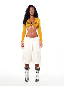 SUMWON WOMEN Long Sleeve Deep V-Neck Twist Front Crop Top With Cursive Script Print Festival Party Spring Summer Night Out - Yellow - View 3