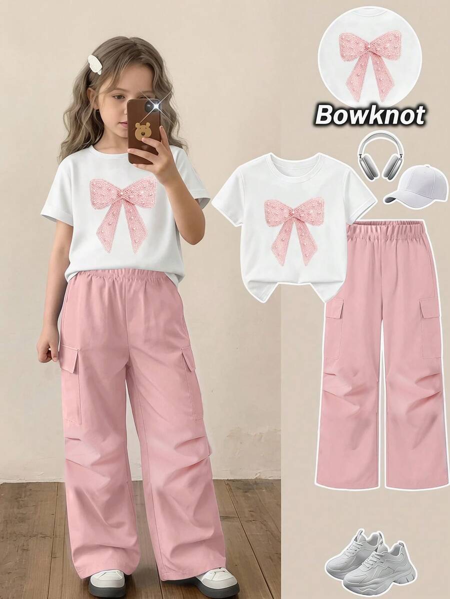 SHEIN 2件組女童T恤與工裝褲套裝,白色T恤搭配粉色工裝褲,蝴蝶結印花設計,時尚設計,寬鬆舒適,適合四季穿著,假日聚會、派對、春夏穿搭 - 彩色 - 查看 1