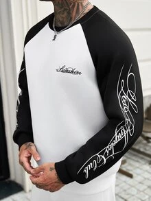 Manfinity CasualCool 男士圓領套頭運動衫，黑白對比色，插肩袖，手寫英文印花，寬鬆版型，時尚男士套頭運動衫，百搭休閒運動衫，柔軟舒適的運動衫面料，適合秋冬/早秋，適用於外出、街拍、居家、旅行、度假、日常穿著等 - 黑與白 - 查看 4