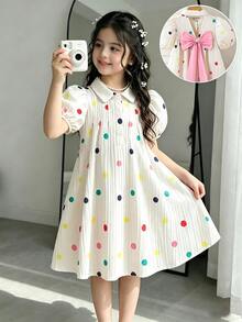 SHEIN Elladie kids 这款女童彩色波点印花纹理面料连衣裙，饰有粉色蝴蝶结，短款泡泡袖，彼得潘领，露背设计，休闲度假风，适合日常穿着、通勤和打造甜美造型。 - 杏色 - 查看 12