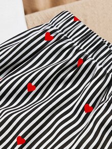 SHEIN Elladie kids 女童春夏休閒時尚新款T恤套裝，正面美式復古數字圖案印花，羅紋圓領，插肩袖T恤上衣搭配休閒長褲，2件套，適合女童美式復古高端極簡休閒舒適甜酷穿搭，適用日常穿著、上學、外出、度假、運動、派對、節日，春夏 - 黑與白 - 查看 5