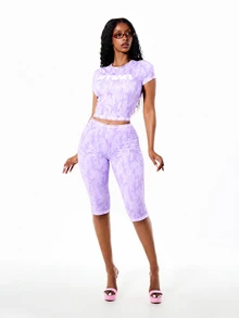 SUMWON WOMEN Lavender Camo Print Crew Neck Short Sleeve Cropped T-Shirt With Chest Logo Detail Summer Ready Workout Gym Streetwear Sport - Lilac Purple - View 5