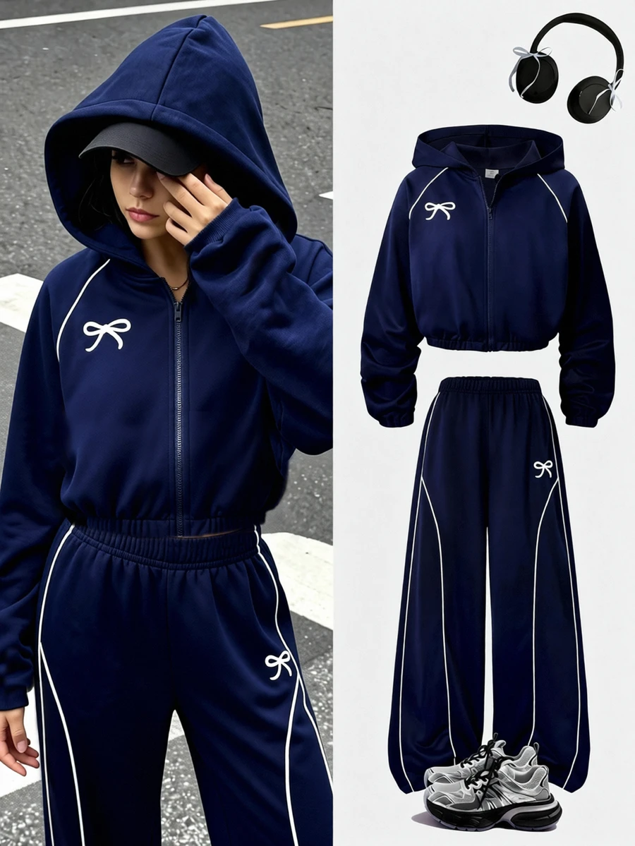 SHEIN Casuvi Kids 青少年女孩 2 件套運動衫套裝,針織純色連帽前開襟落肩袖運動外套,搭配同款寬鬆寬腿長運動長褲,對比色條紋與蝴蝶結圖案印花,適中厚度,適合春秋日常休閒與運動穿著 - 藏蓝色 - 查看 1