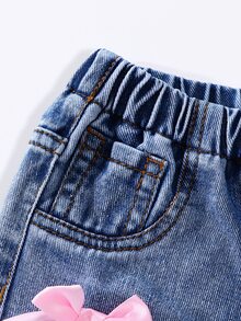 Genkimix Kids 女嬰牛仔褲 夏季新品 可愛休閒 中藍色水洗牛仔 破洞磨損設計 附粉色蝴蝶結裝飾 鬆緊腰 寬鬆直筒版型 舒適棉質 日常穿著 度假出遊街頭風 - 中等水洗藍 - 查看 6