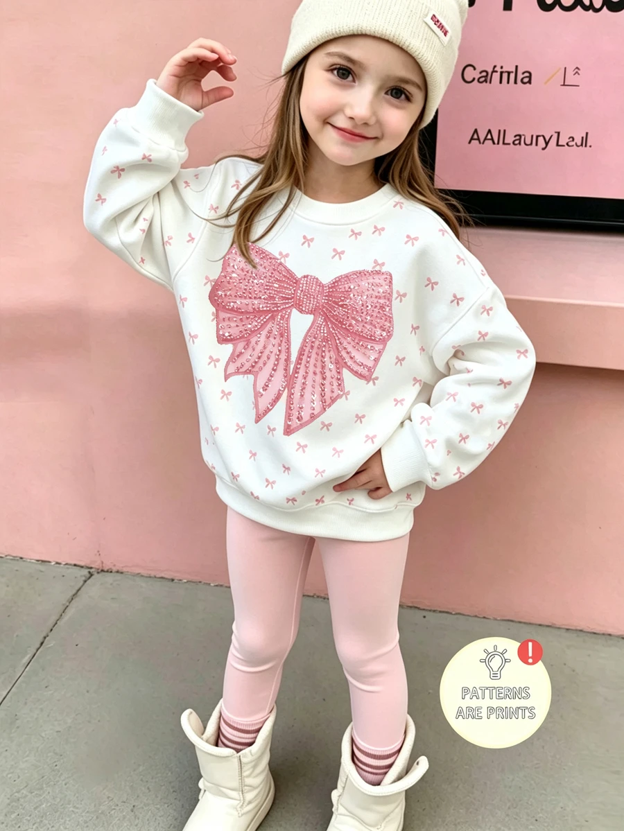 Conjunto de sudadera con estampado de lazos dulces para niñas, top de cuello redondo de manga larga en color blanco crema con pequeños lazos rosas y estampado de lazos de lentejuelas falsas en el pecho, combinado con pantalones ajustados de color rosa claro sólido, ajuste holgado y cómodo, estilo coreano fresco, conjunto casual de 2 piezas para niñas en primavera/otoño/invierno, fácil de combinar y combinar - Multicolor - Ver 1