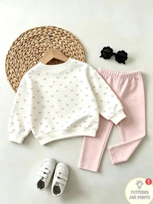 Conjunto de sudadera con estampado de lazos dulces para niñas, top de cuello redondo de manga larga en color blanco crema con pequeños lazos rosas y estampado de lazos de lentejuelas falsas en el pecho, combinado con pantalones ajustados de color rosa claro sólido, ajuste holgado y cómodo, estilo coreano fresco, conjunto casual de 2 piezas para niñas en primavera/otoño/invierno, fácil de combinar y combinar - Multicolor - Ver 2