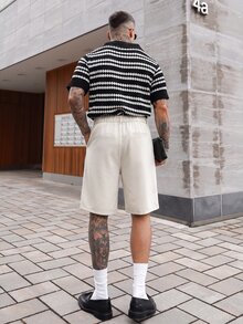 Artur Kramer 男士街头风多功能单品：褶裥双扣设计宽松休闲短裤，适合街头穿搭、日常休闲、周末郊游、音乐节、社交聚会等各种年轻社交场合。这款短裤是男士衣橱中不可或缺的百搭单品，也是送给男友或丈夫的绝佳礼物。阔腿设计 - 杏色 - 查看 4