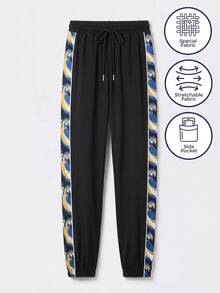 CAJUNI Women's Jogger Pants With Drawstring Waist And Blue Macaw Tropical Print - Black - View 5