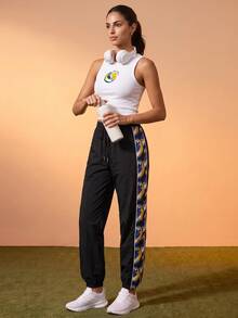 CAJUNI Women's Jogger Pants With Drawstring Waist And Blue Macaw Tropical Print - Black - View 8