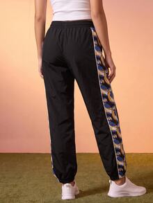 CAJUNI Women's Jogger Pants With Drawstring Waist And Blue Macaw Tropical Print - Black - View 2