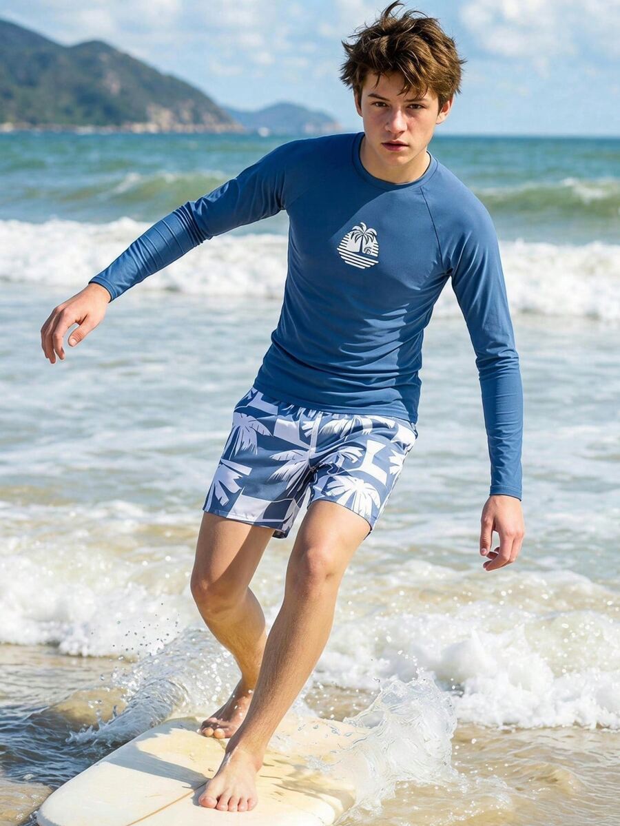 SHEIN Teen Boys Swimwear, Sun Protection Surfing Style, Main Body In Low-Saturation Gray-Green, White Coconut Tree Silhouette Print On Chest, Round Neck Long Sleeve Cut, Raglan Sleeve Design, Pants In Gray-Green Base Color With White Coconut Tree Silhouette Print, Loose Straight Knee-Length Fit - Blue - View 1
