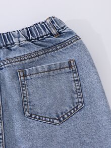 SHEIN 青少年女孩牛仔裙，甜美可愛休閒學院風，日常基礎穿搭推薦，黃色與白色花卉星形毛巾刺繡，獨特不對稱腰部設計，後開衩細節，修身剪裁，可搭配T恤、針織毛衣或短版上衣，適合日常外出、購物、用餐或與朋友聚會派對 - 淺色水洗藍 - 查看 6