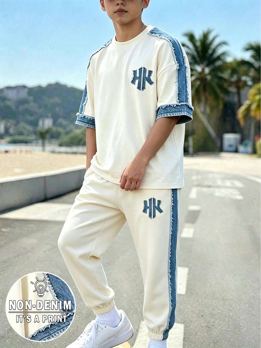 SHEIN 青少年男孩字母印花拼色上衣套裝 寬鬆拼接校園街頭休閒穿搭 開學季秋季 白色海軍藍上衣短褲套裝 - 彩色 - 查看 1