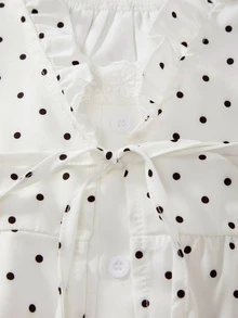 GlowEve Women's Polka Dot Print Fashionable Elegant Tie-Front Ruffle Hem Blouse - Black and White - View 4