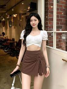 SHEIN Frenchy Tassel Decor Ring Linked Bow Tie Wrap Mini Asymmetrical Hem Skort - Coffee Brown - View 1