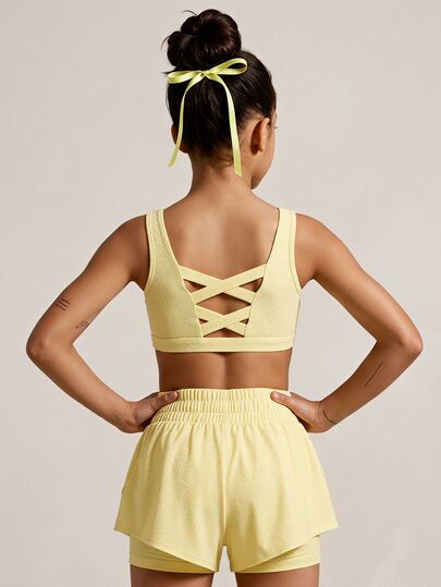 SHEIN Young Girls Yellow Textured Workout Set With Double Criss Cross Strap Back Sports Bra And 2 In 1 Running Shorts High Waist Activewear 2pc Outfit