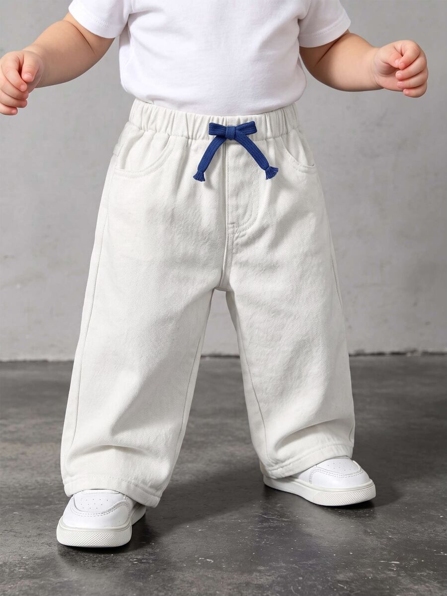 SHEIN Baby Boys White 100% Cotton Denim Long Pants, Fresh Minimalist Fashion Casual Versatile, Elastic Waist With Dark Blue Drawstring, Straight Leg Fit, Soft And Comfortable Denim Fabric, Suitable For Daily Wear, Can Be Paired With T-Shirts, Shirts Or Knitwear, Suitable For School Or Light Outdoor Scenes, Suitable For Spring And Summer Wear - White - View 1