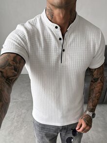Manfinity Homme 男士立領短袖襯衫，鈕扣門襟設計簡約俐落，對比滾邊細節增添高級感。適合日常通勤、戶外散步、休閒聚會。整體風格乾淨優雅，豐富配色可選，百搭易搭配，適合作為男士禮物。 - 白色 - 查看 4
