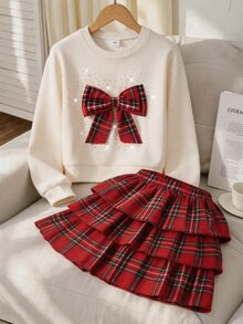 SHEIN ChillGRL Tween Girls 2pcs Fall Outfit, Cute Bow Long Sleeve T-Shirt & Red Plaid Layered Ruffle Skirt Set, Preppy School Style Christmas Holiday Clothes - Red - View 1