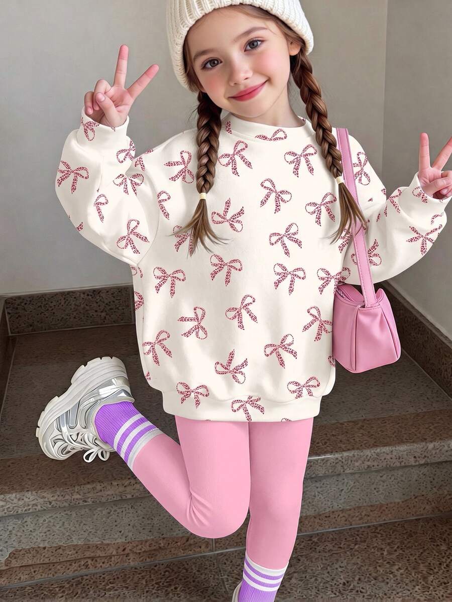 SHEIN 两件套少女奶油白和奶油粉复古豹纹蝴蝶结印花圆领舒适长袖卫衣和打底裤套装,适合秋冬季节,休闲穿搭,舒适易穿,适合秋季叠穿,时尚童装,休闲服饰,儿童印花服装,返校季,秋季服装,返校节,适合户外野餐、街头摄影、居家、校园等场合,休闲舒适。 - 彩色 - 查看 1
