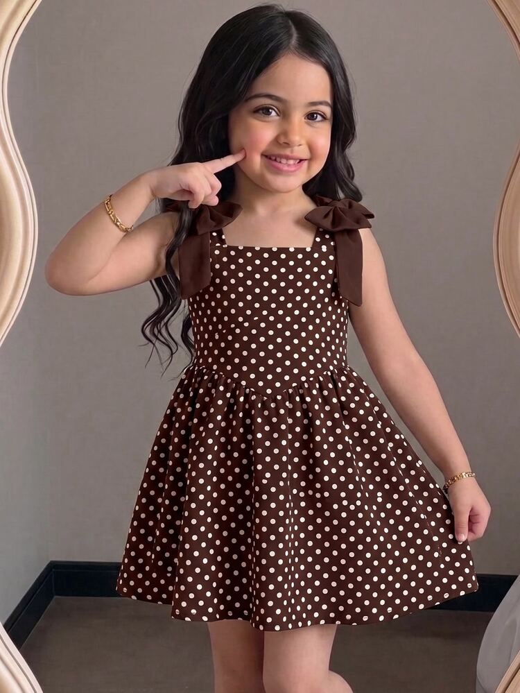 SHEIN Young Girl 3D Jacquard Spaghetti Strap Dress, Textured Jacquard Fabric, Square Neckline, Bow Decor On Shoulders, Cinched Waist, Full Skirt, Soft And Structured, Suitable For Multiple Seasons, Exquisite Jacquard, Perfect For Daily Wear And Party Occasions, Loose Fit, Easy To Style And Care For, Creates A Gentle And Sweet Little Princess Look, Pale Yellow - Yellow - View 3