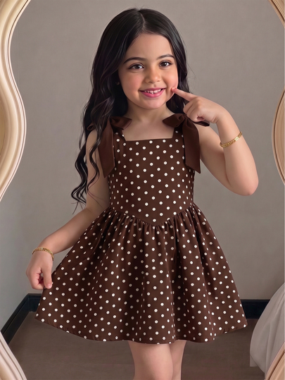 Vestido de tirantes finos con jacquard 3D para niña, tela de jacquard texturizada, escote cuadrado, decoración de lazo en los hombros, cintura ceñida, falda completa, suave y estructurado, adecuado para múltiples estaciones, jacquard exquisito, perfecto para uso diario y ocasiones de fiesta, ajuste holgado, fácil de estilizar y cuidar, crea un look de pequeña princesa dulce y delicada, amarillo pálido
