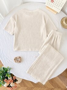 SHEIN Serisse Kids 女童寬鬆休閒極簡舒適針織紋理圓領短袖T恤與長褲2件套，返校穿搭，日常穿著，棕色套裝，兒童針織套裝 - 杏色 - 查看 5