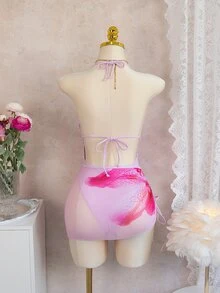 Costavie Bonvoyette 新款女士优雅浪漫粉彩两件式比基尼套装，花卉印花挂脖两件式泳衣，搭配透视网纱罩衫迷你裙，饰以粉紫色百合印花，深V领点缀象牙色/奶油色珍珠，腰部褶皱设计，可调节挂脖肩带，是热带夏季海滩度假、泳池派对和浪漫度假村之旅的完美之选，尽显海岛风情和摩登气息。 - 粉色 - 查看 5