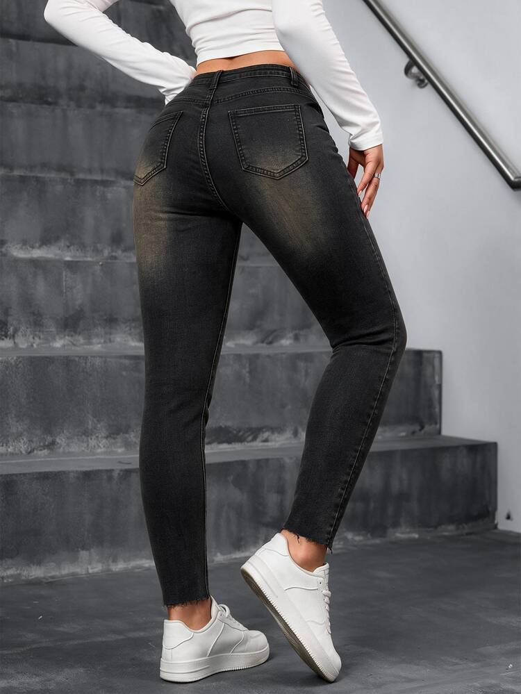 Jeanoix Jeans ajustados con roturas y bajo sin rematar - Negro - Añade 2