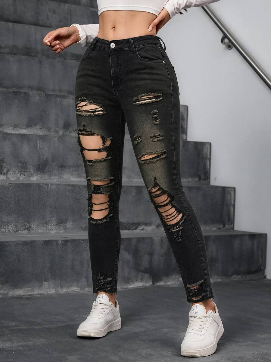 Jeanoix Jeans ajustados con roturas y bajo sin rematar - Negro - Ver 1